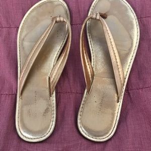 Banana Republic gold flip flops. Size 9 Great condition.